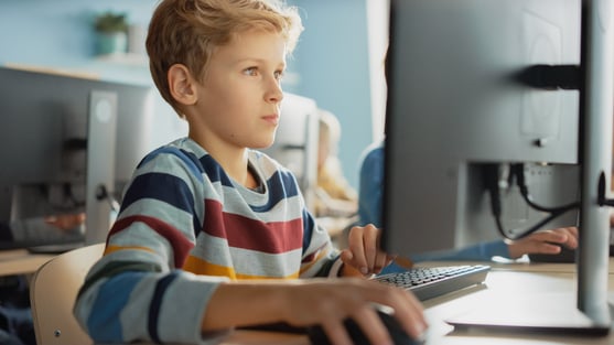 Young male student at computer